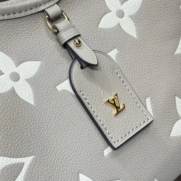 Louis Vuitton Carry All Beige - Image 9
