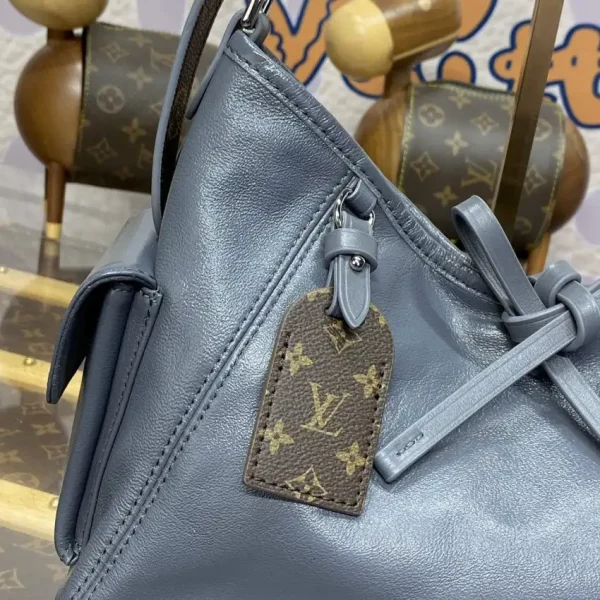 Louis Vuitton Carry All PM - Image 9